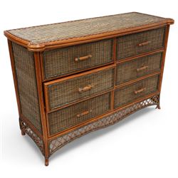 20th century rattan and cane chest in neutral tones, fitted with six drawers, lattice woven apron over splayed feet