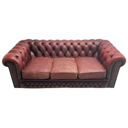 Chesterfield three-seat sofa upholstered in red buttoned leather