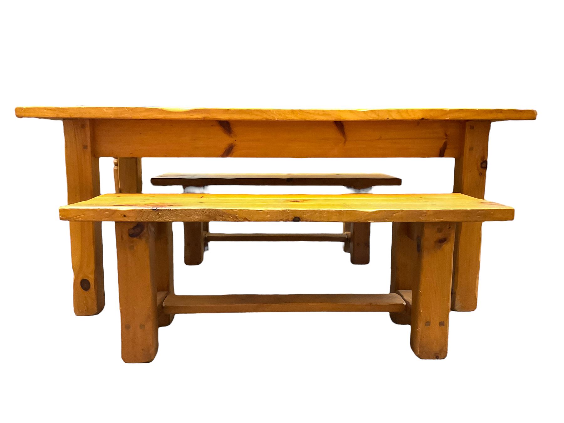 Pine dining table, rectangular plank top on square supports (181cm x 91cm, H80cm); together with two benches (133cmx 41cm, H47cm)