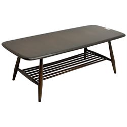 Ercol - dark elm coffee table, rectangular top on splayed supported united by undertier 
