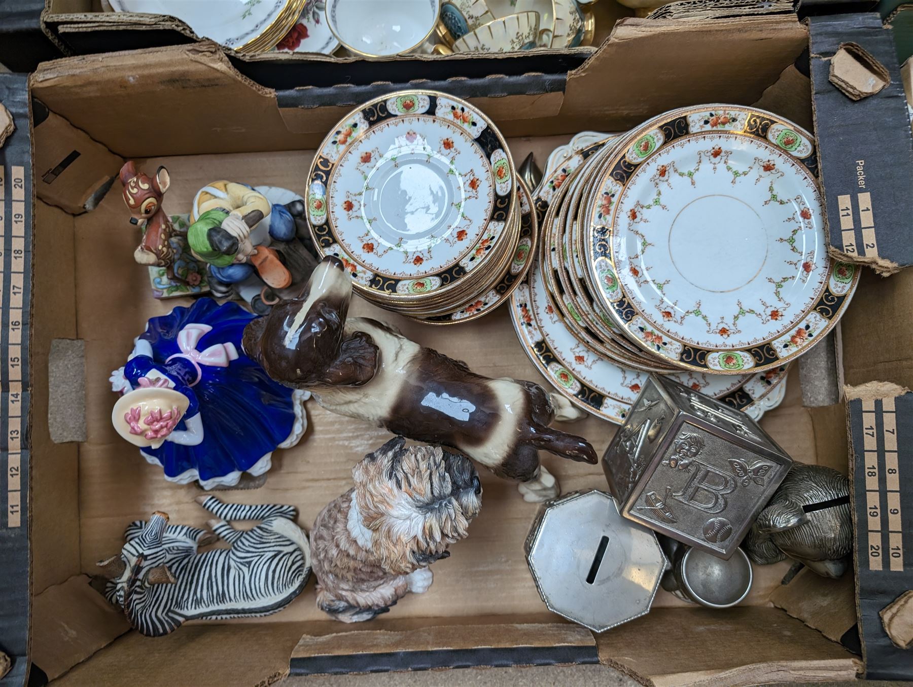 Collection of glassware and ceramics, including Royal Doulton figure 'Mary', rock crystal animal and dancer figures, tea wares, animal figurines, metal money boxes, etc, in four boxes 