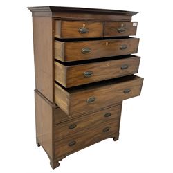 Early 19th century mahogany chest-on-chest, projecting cornice over banded frieze, fitted with two short over six long graduating cock-beaded drawers with bone and timber escutcheons, on bracket feet