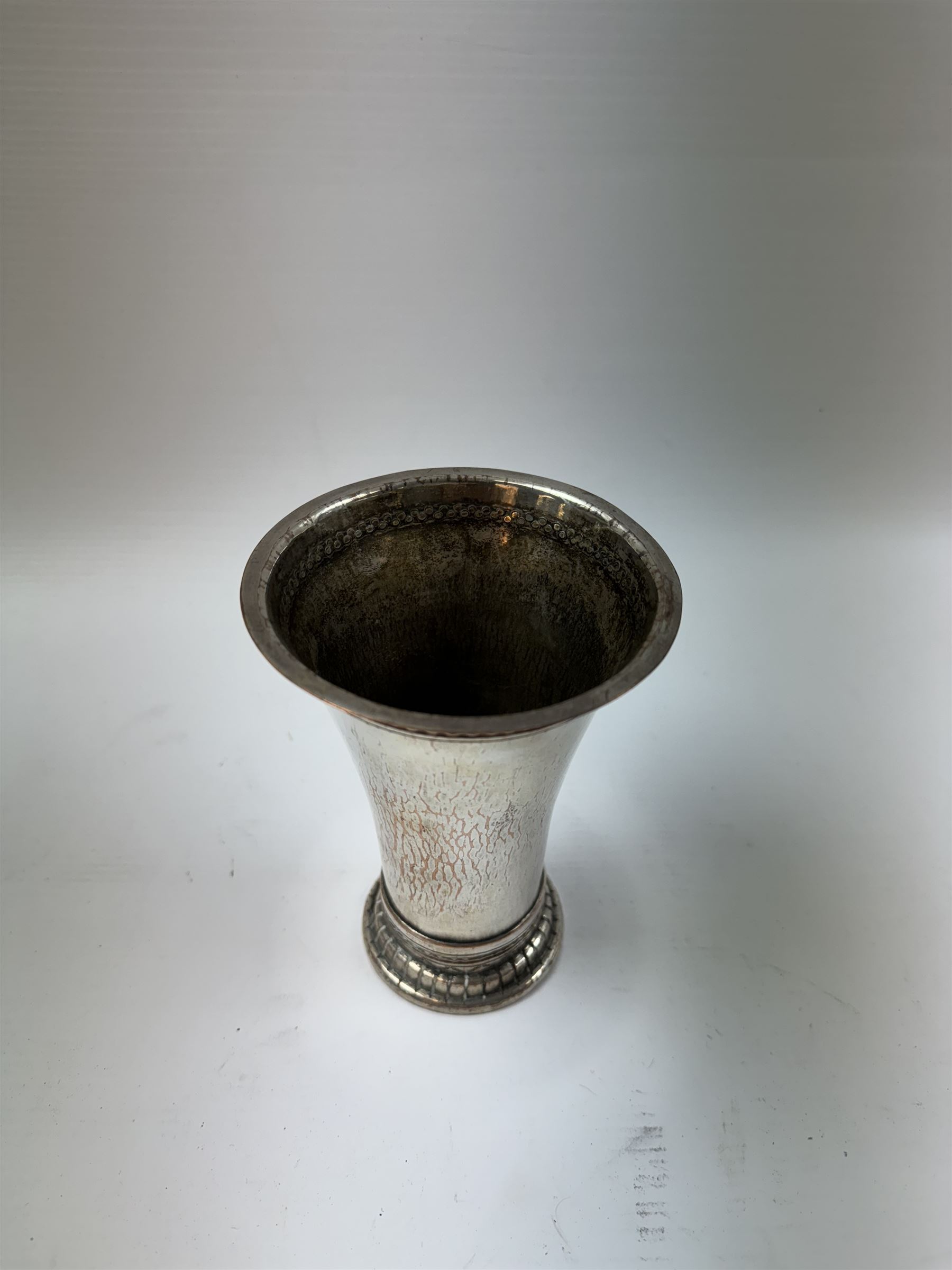 Keswick School of Industrial Arts, an Arts and Crafts plated copper vase, flared cylindrical form, stamped KSAI beneath, H14cm