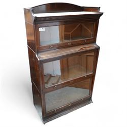 The Lebus Bookcase - early 20th century mahogany Globe Wernicke design three sectional stacking bookcase, fitted with glazed up-and-over doors 