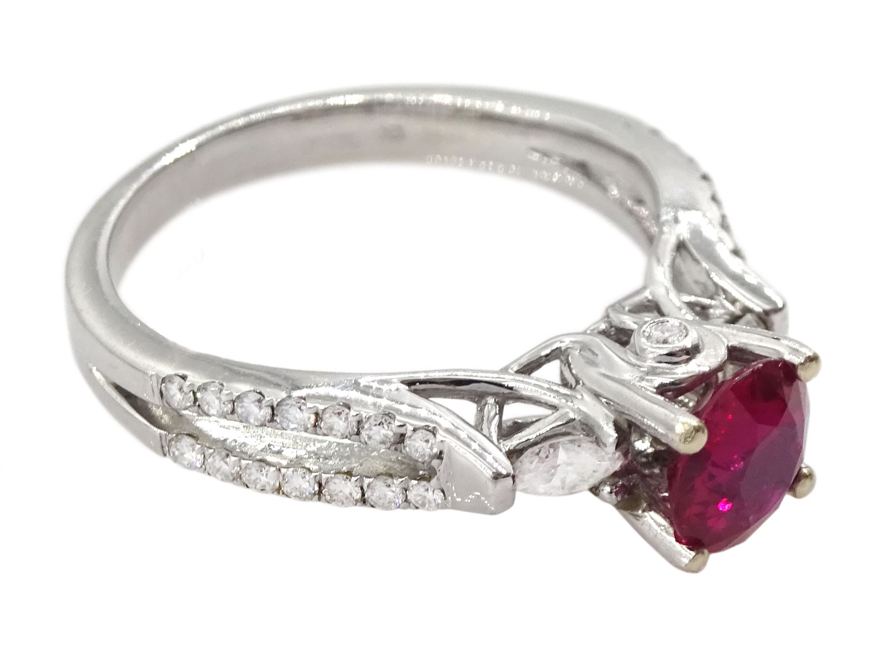 18ct white gold three stone round cut ruby and pear cut diamond ring, with diamond set gallery and two row diamond set shoulders, hallmarked, ruby approx 0.85 carat