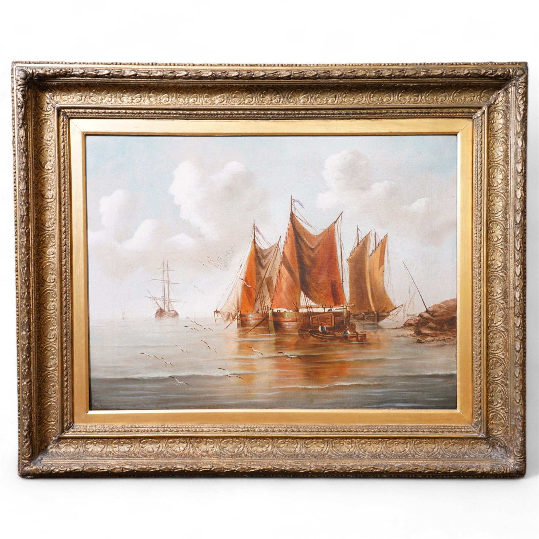 English School (Early 20th century): Fishing in Calm and Rough Seas, pair oils on canvas unsigned, in matching heavy antique gilt frames with repeating anthemion decoration 60cm x 80cm (2)