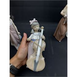 Group of Lladro figures, to include May Dance no 5662, examples modelled as a female golfer, young woman holding sheep in her arms, pair of figures in pink dressed holding sun hats, etc., together with two Nao figures and a further Spanish example, (11)