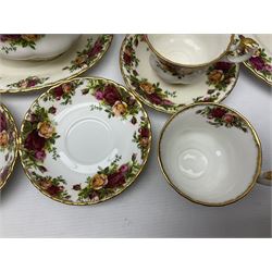 Royal Albert Old Country Roses pattern coffee set for four, comprising coffee pot, milk jug, cups and saucers, cake plate, together with six dinner plates, side plates etc (34) 