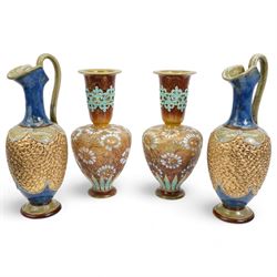 Pair of Doulton Lambeth Slaters Patent stoneware vases, of shouldered tapering form with chine floral body and turquoise pierced neck, no. 3518X, H30cm, together with a pair of Royal Doulton ewers with textured gilt bodies within beaded borders, impressed no. 8293 (4)