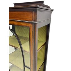 Edwardian inlaid mahogany display cabinet, shaped and raised back over single astragal glazed door, interior lined and fitted with two shelves, raised on square tapering supports