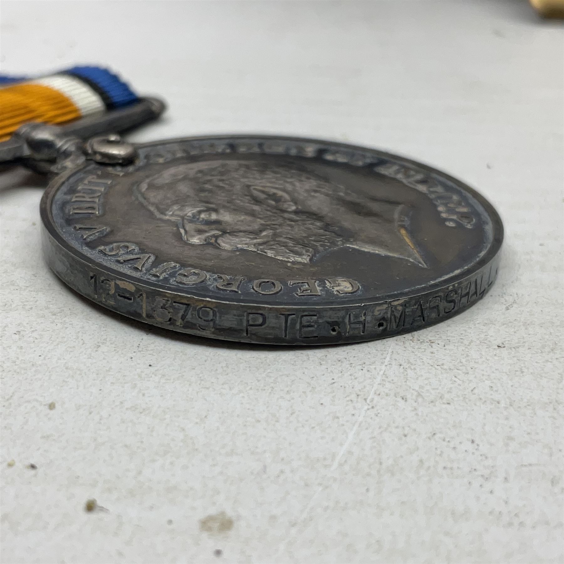 WWI pair of medals comprising British War Medal and Victory Medal awarded to 12-1379 Pte. H. Marshall York and Lanc. R.; both with ribbons in display case; and WWII 1939-1945 Star