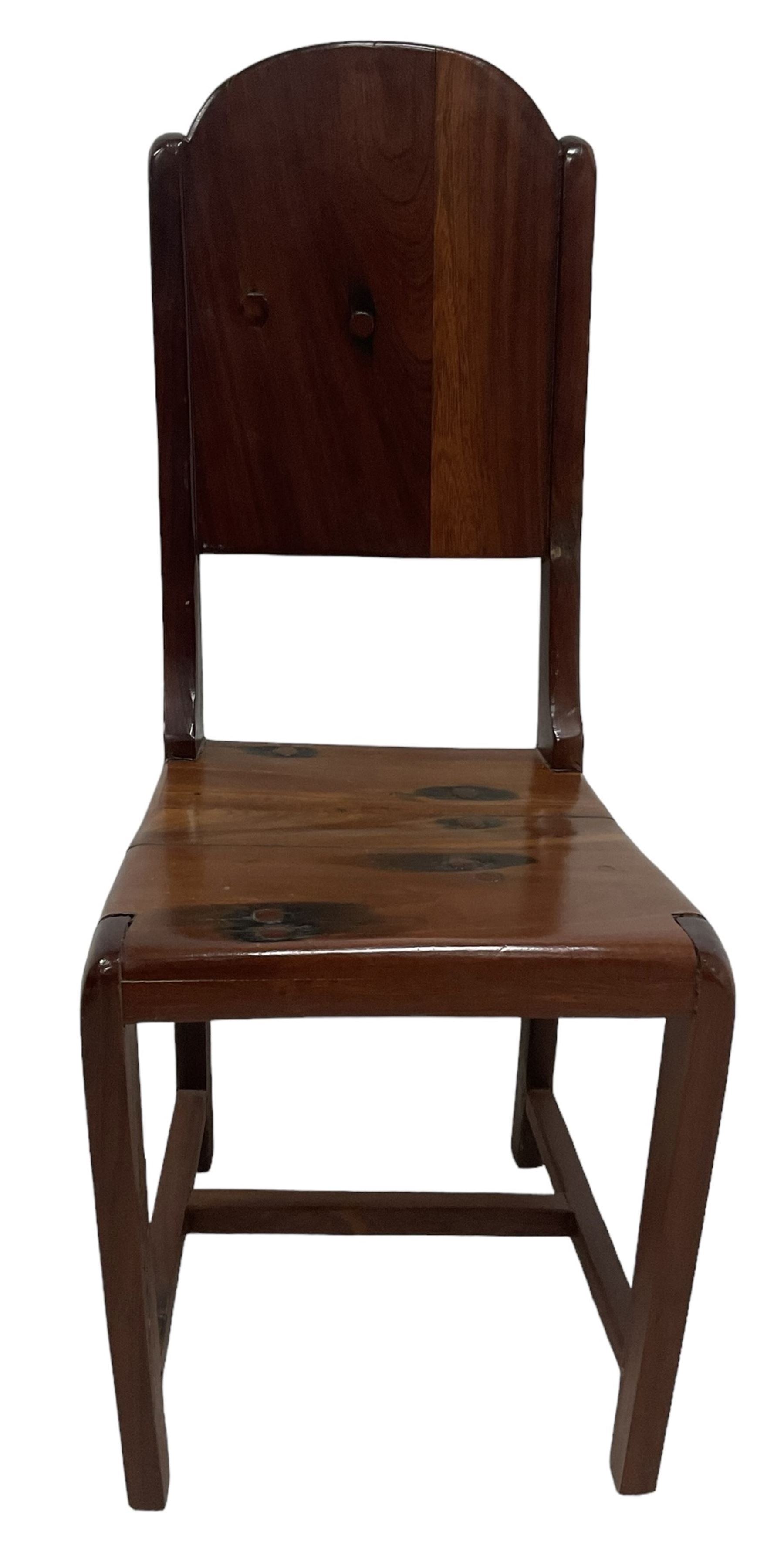 Mid-to-late 20th century teak dining table, rectangular top with canted corners, on square tapering supports with spade feet (214cm x 119cm, H76cm); and a set of eight Burmese reclaimed teak dining chairs, high arched back over panelled seat