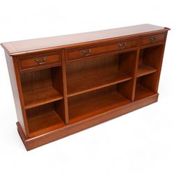 Georgian design yew wood open bookcase, fitted with three drawers above three open shelves, flanked by fluted uprights