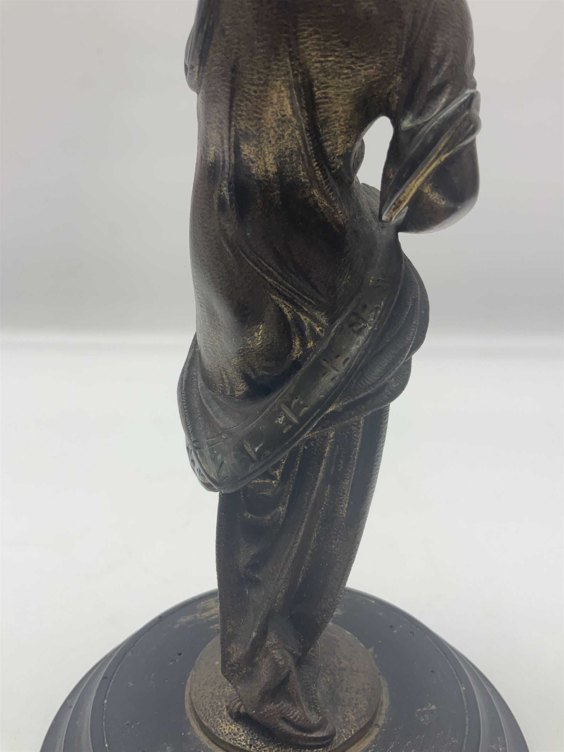 Gilt bronze figure of a lady in neo-classical dress, on a circular wooden plinth, H26cm