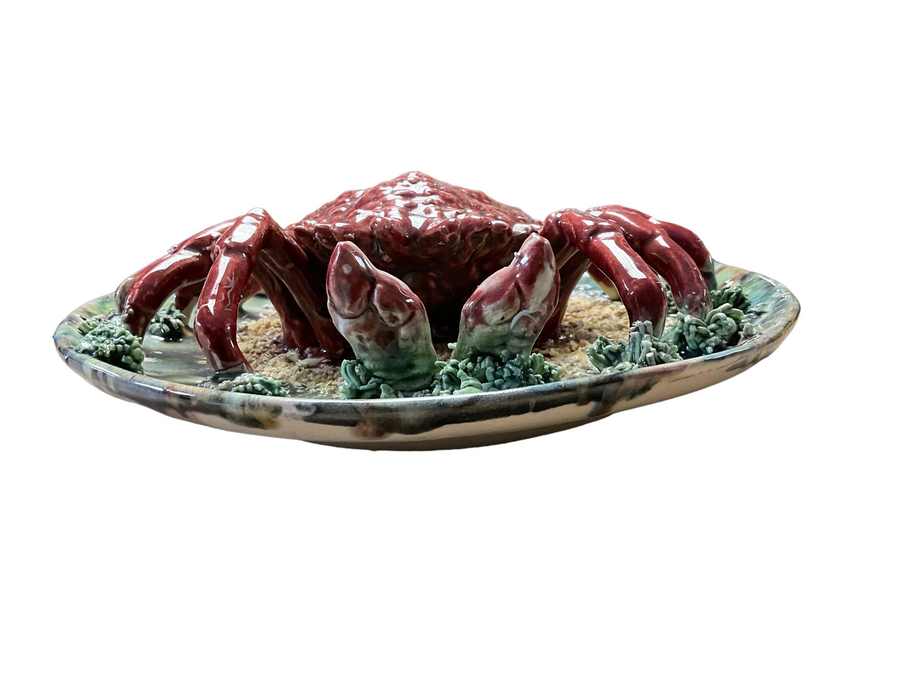 20th Century Portuguese Palissy style Majolica wall plate, depicting a crab to the centre, modelled in relief surrounded by encrustations and shells, D23cm