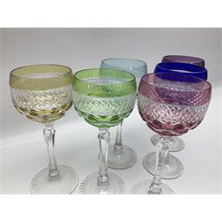 Set of six Harlequin coloured glass hock glasses, each with a band of hobnail decoration, upon faceted stems, H19.5cm