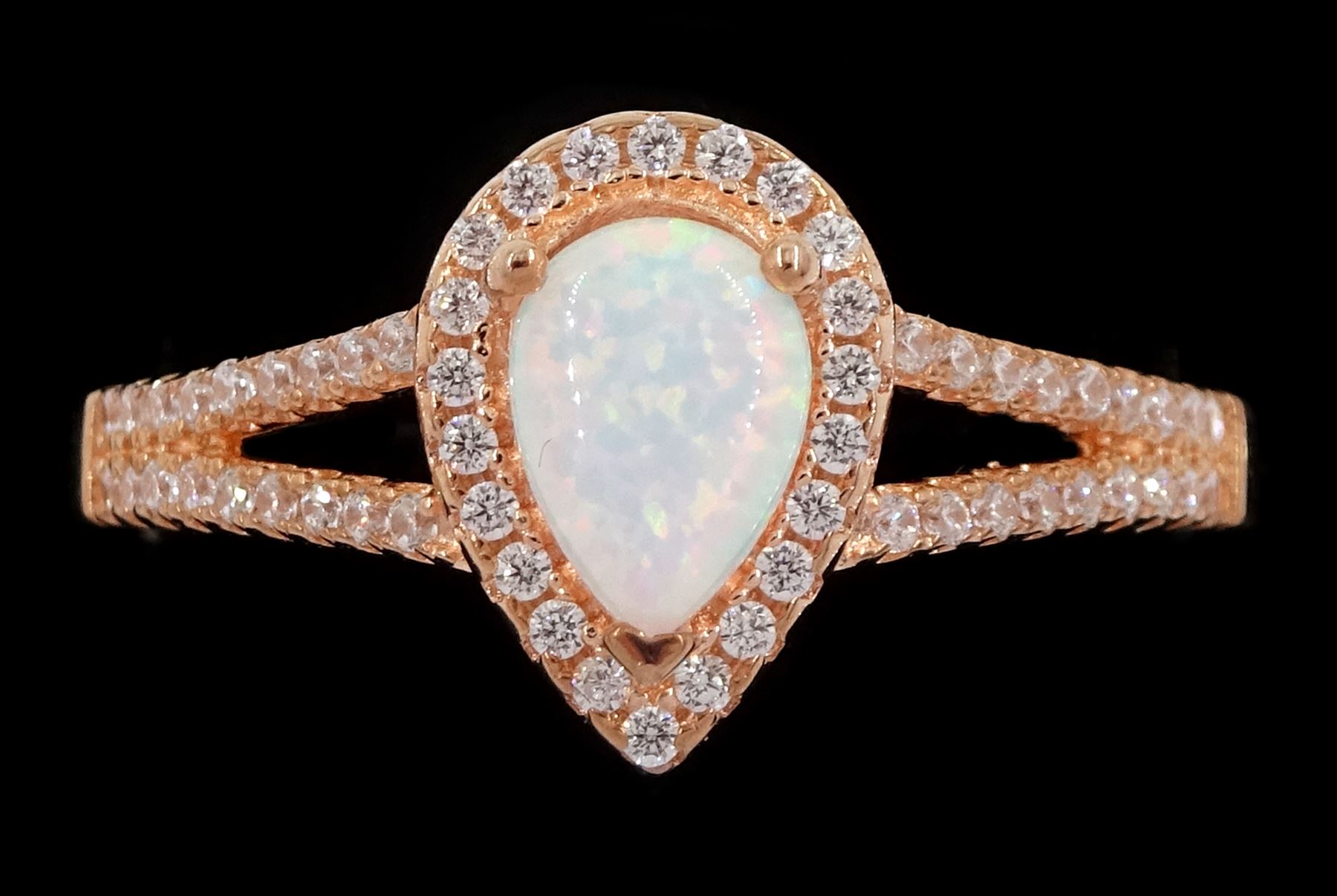 Rose gold on silver pear cut opal and cubic zirconia  cluster ring, stamped 925