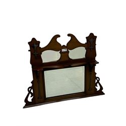 Arts & Crafts period walnut overmantel mirror, shaped pediment over shelf, rectangular bevelled mirror plate within applied mouldings, shaped and pierced corner brackets, decorated with shaped copper mounts 