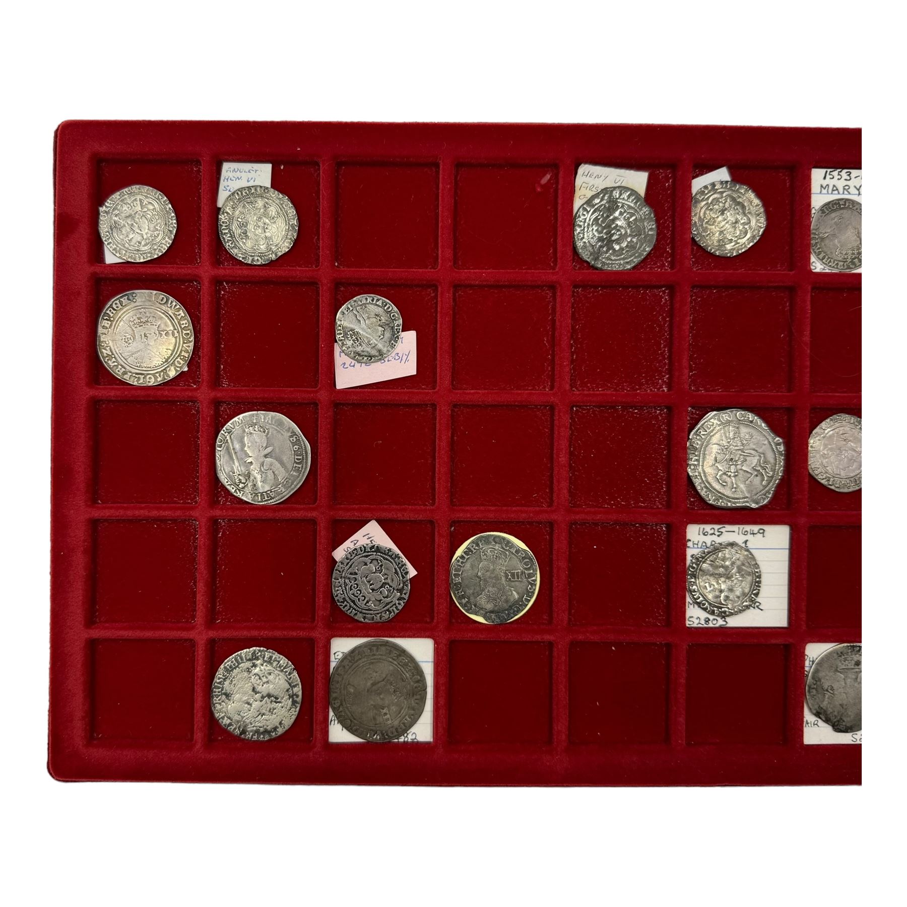 Silver coins, including Edward VI (1547-53) shilling, Philip and Mary shilling, Charles I (1625-49) sixpence and shilling etc, housed in a coin tray