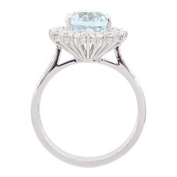 18ct white gold oval cut aquamarine and round brilliant cut diamond cluster ring, hallmarked, aquamarine approx 2.55 carat, total diamond weight approx 0.80 carat