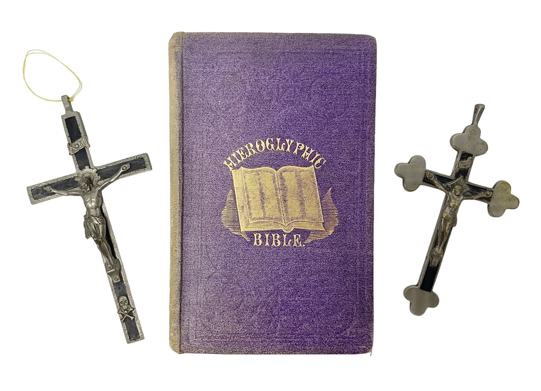 Early 20th century Hieroglyphic Bible or Select Passages from the Old and New Testament Represented by Emblematical Figures For The Amusement and Instruction of Youth, pub. Houlston and Sons, London, together with a wooden crucifix with metal banding and details, including skull and crossbones motif, and one other crucifix