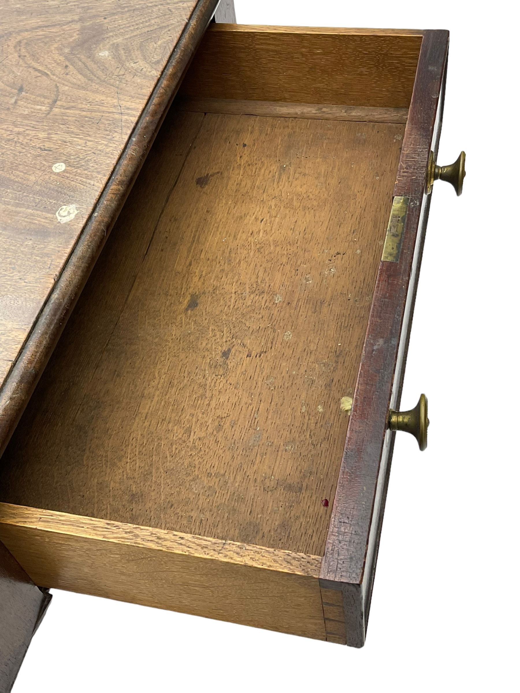 George III mahogany Pembroke table, moulded rectangular drop-leaf top with rounded corners, fitted with single cock-beaded end drawer, on turned pedestal with four reed moulded supports, brass cups and castors 