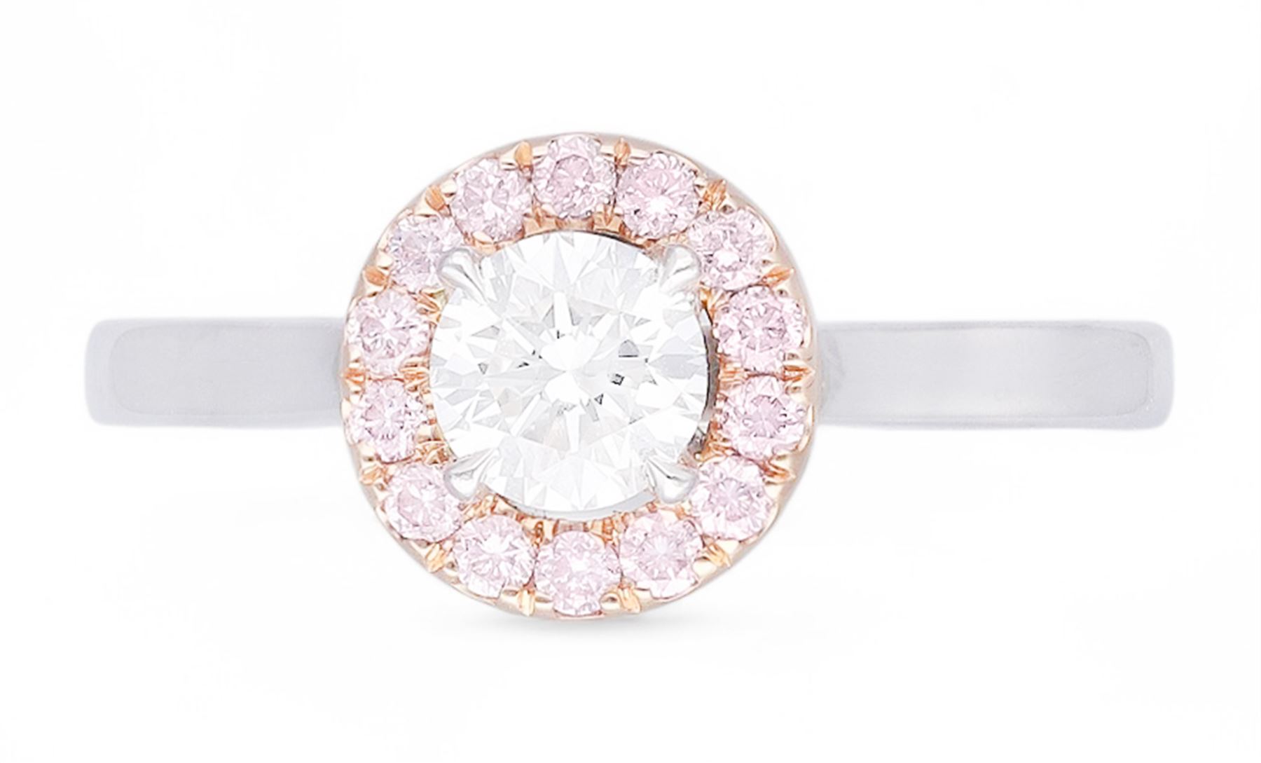 Platinum and 18ct rose gold round brilliant cut diamond halo cluster ring, the principal white diamond of 0.52 carat, with GIA report, colour D, clarity VS1, surrounded by pink diamonds of approx 0.20 carat, hallmarked