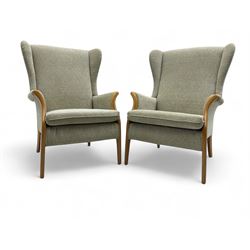 Parker Knoll - pair of beech framed armchairs, upholstered in leaf motif fabric, high back...