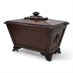 William IV mahogany cellarette of sarcophagus form, the panelled top surmounted by a gadro...