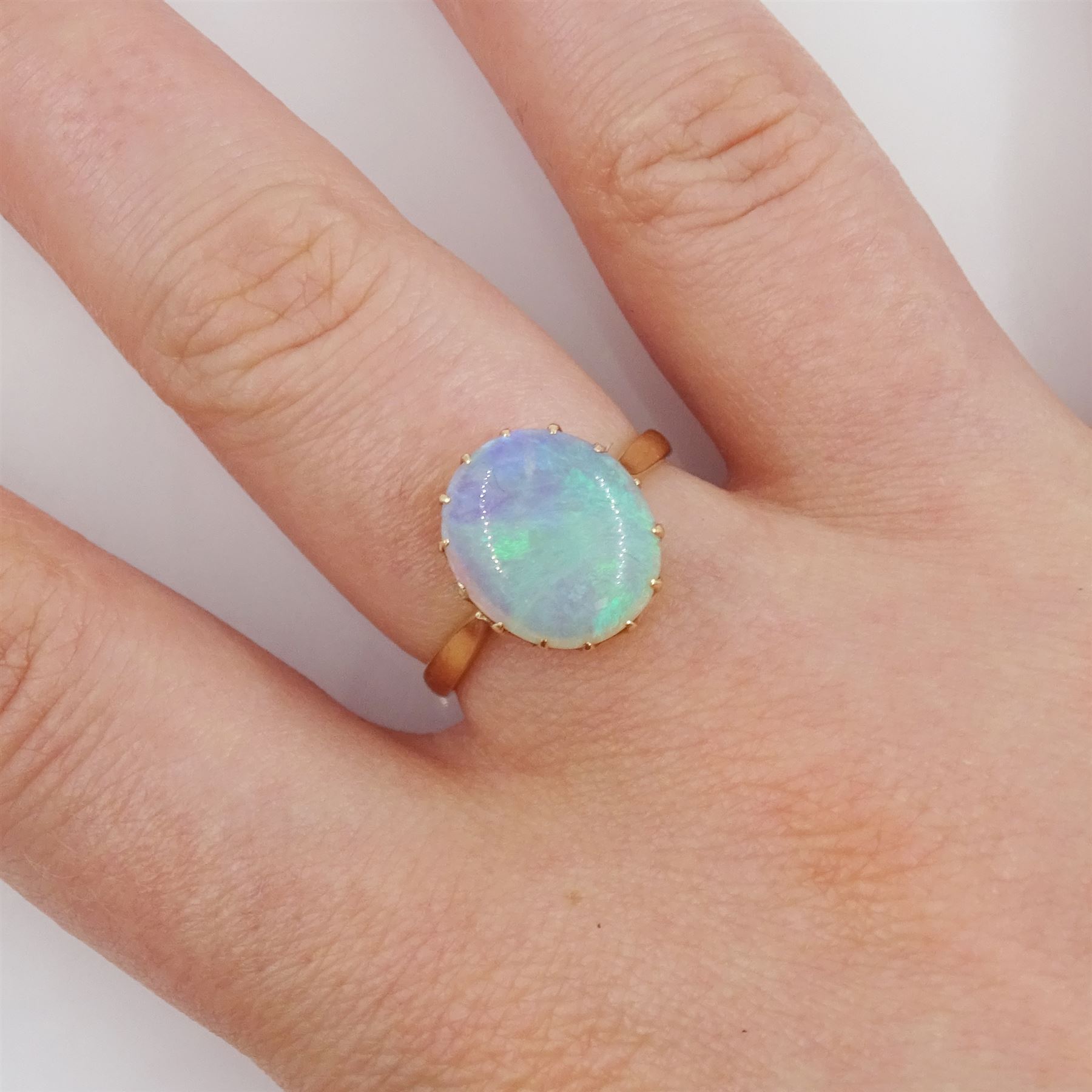 Gold single stone opal ring, stamped 9ct, opal approx 2.80 carat