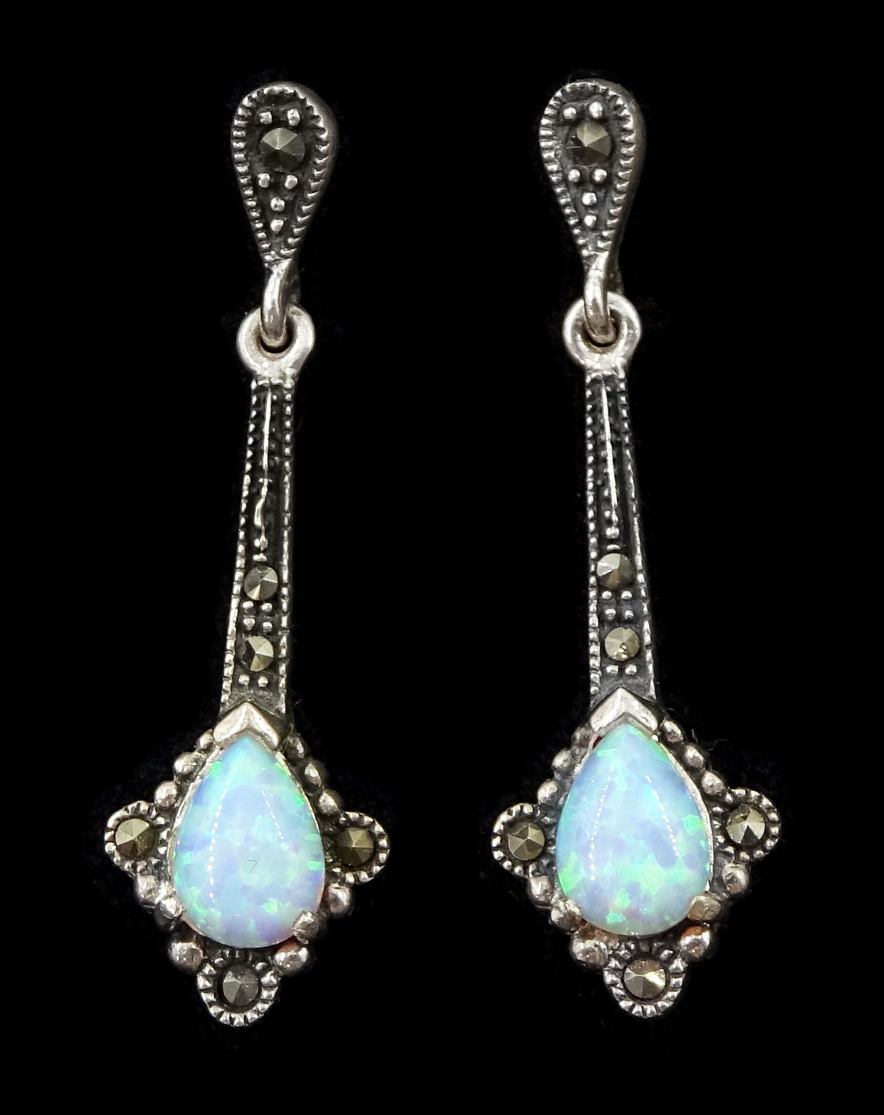 Pair of opal and marcasite silver pendant earrings, stamped 925