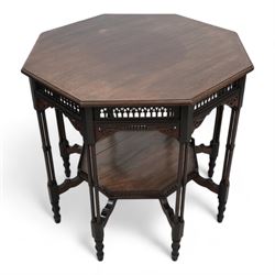 Late 19th to early 20th century mahogany octagonal centre table, moulded top over pierced arcade frieze rails and fretwork brackets, on eight cluster column supports terminating to turned feet, united by under tier with raised gallery 