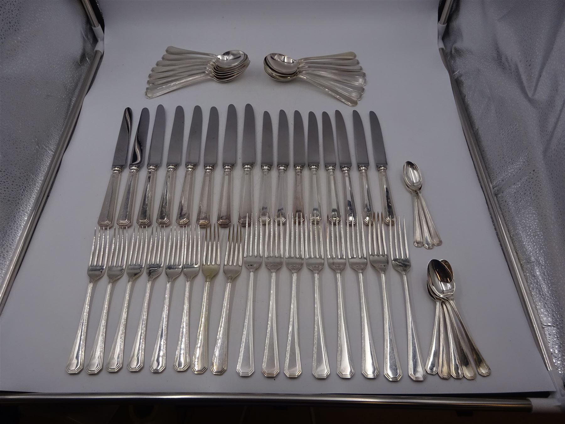 Mappin & Webb Athenian pattern silver cutlery for eight place settings, comprising table forks, silver handled table knives, dessert spoons, dessert forks, silver handled butter knives, soup spoons and teaspoons, hallmarked Mappin & Webb Ltd, Sheffield 1978, contained within anti-tarnish fabric wraps and boxed 