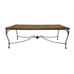 Mid-20th century coffee table, rectangular tiled wooden top framed by bamboo detailing, supported by wrought iron base with scrolled legs and central mosaic accent