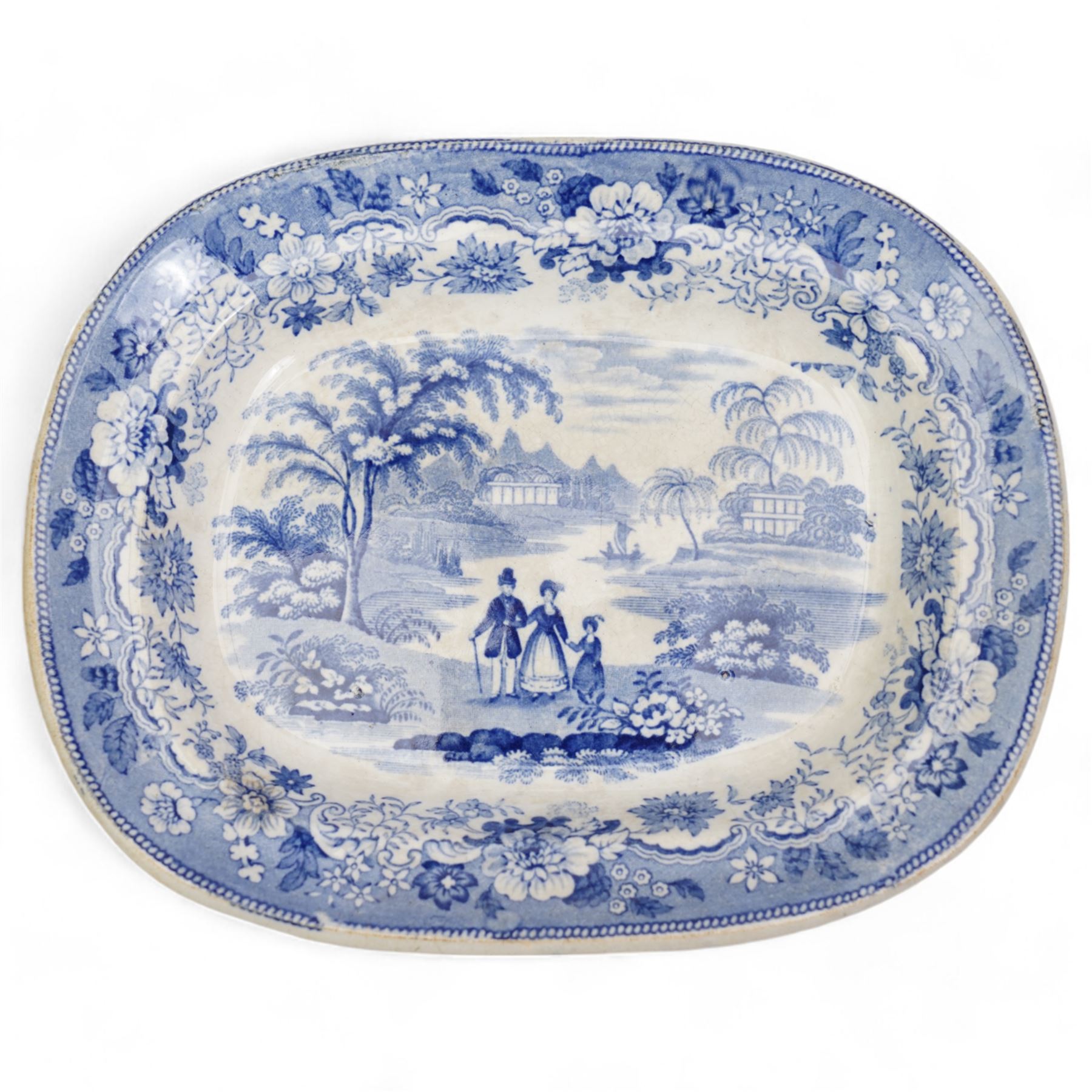 Early 19th century J & R Clews blue and white transfer printed meat plate, decorated in the Castle Pattern, L54cm, another decorated in 'The Villager' pattern, attributed to Turner, another meat plate and small oval stand (4)