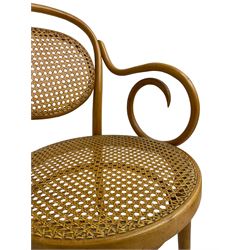 After Michael Thonet - bentwood armchair, circular cane seat and back, scrolled arms