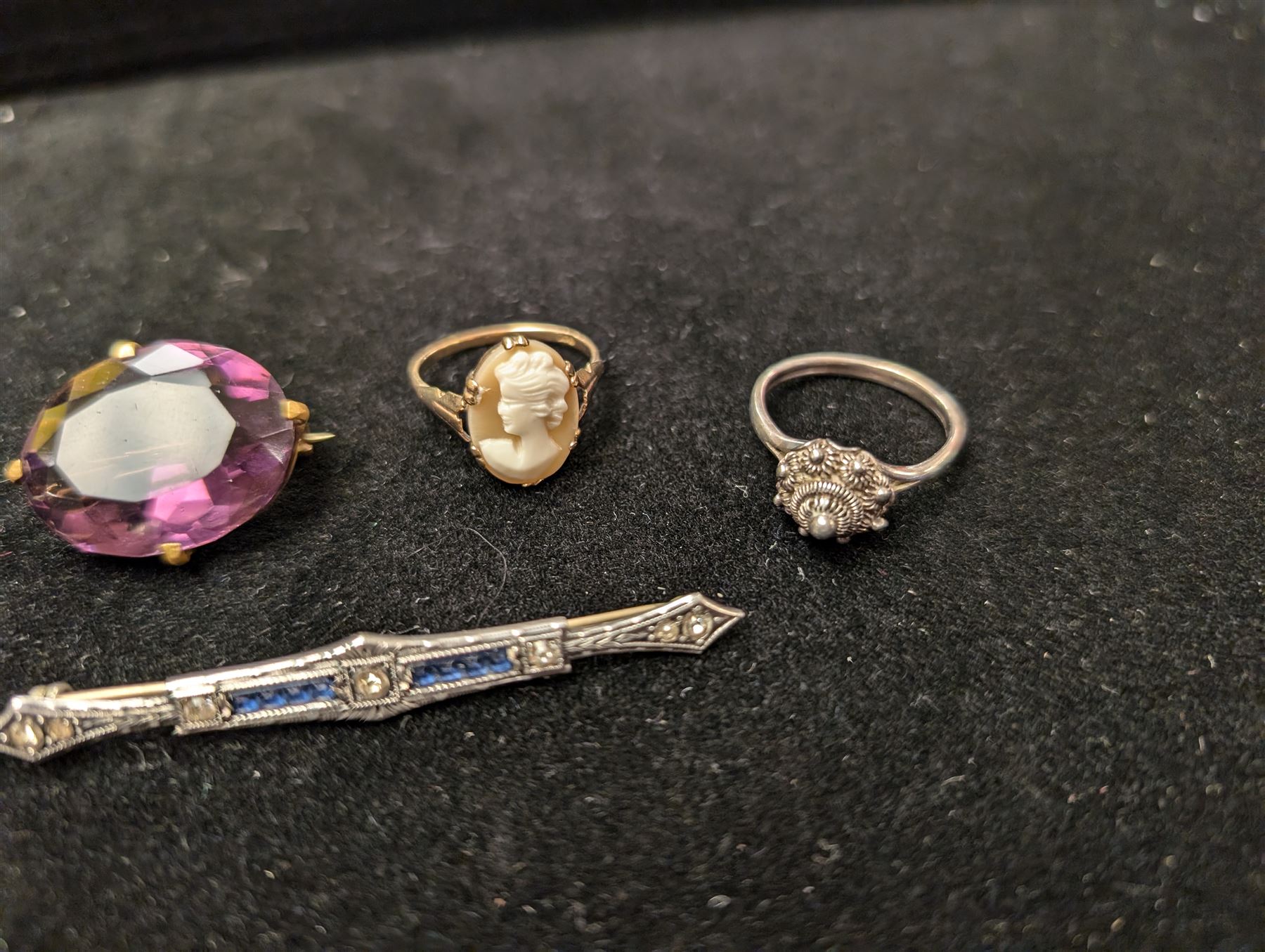 9ct gold cameo ring, silver paste set brooch, gold stone set stick pin. paste brooch and one other ring