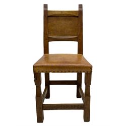 Gnomeman - set of eight (6+2) oak dining chairs, adzed panelled back over tan leather upholstered seat with applied stud band, on square supports united by plain stretchers, each chair carved with gnome signature, by Thomas Whittaker, Littlebeck, Whitby