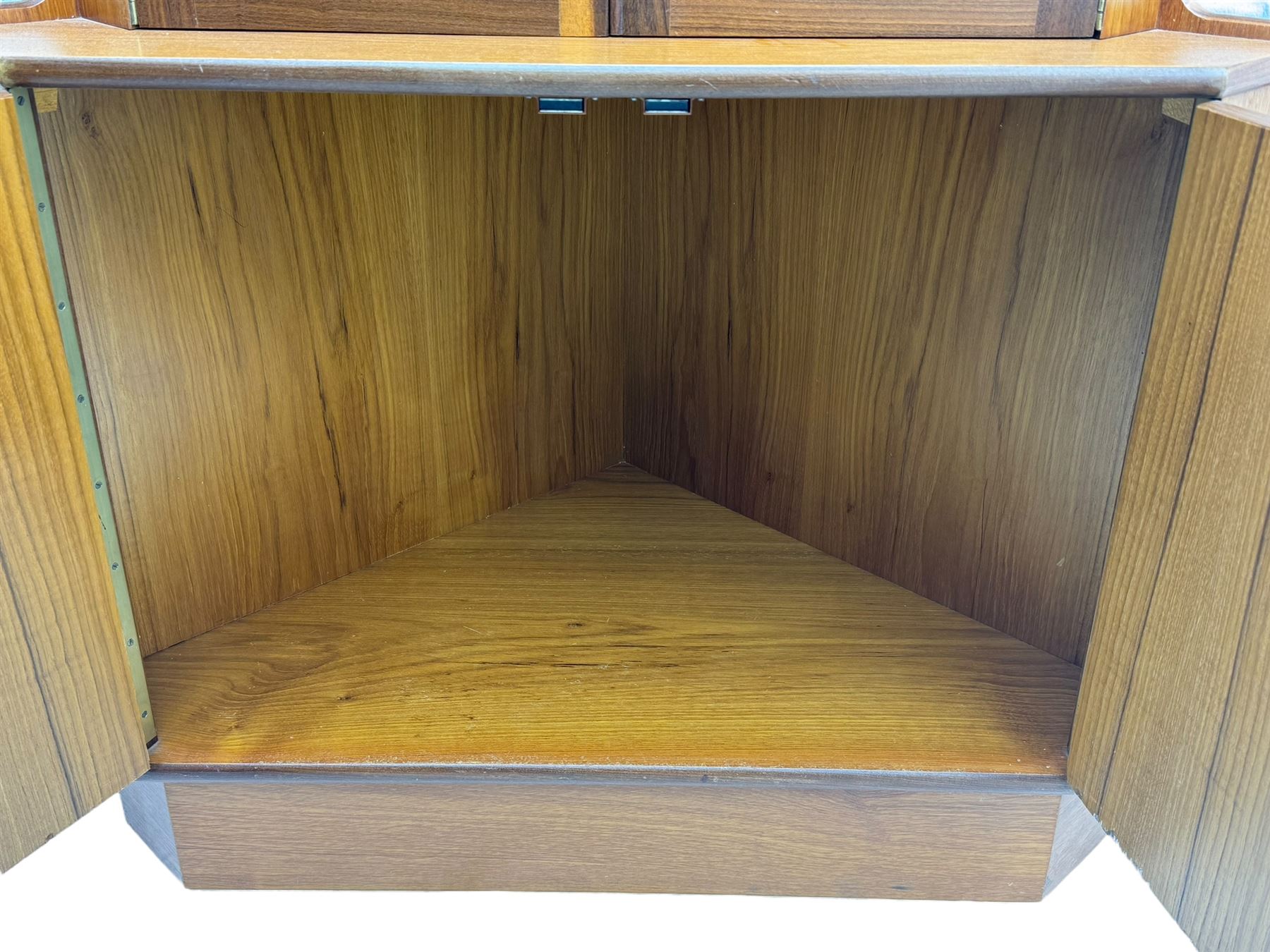 Nathan - teak corner display cabinet, double glazed doors enclosing two adjustable shelves over single cupboard.