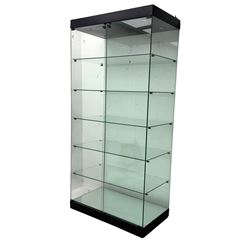 Glazed shop display cabinet fitted with two doors, six shelves with illuminated interior