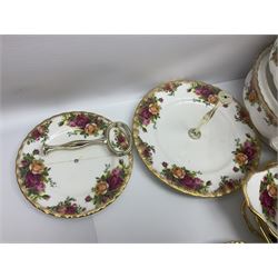 Royal Albert Old Country Roses pattern part tea and dinner service, to include two tureens, eight dinner plates, six side plates, twelve bowls, two mugs, seven teacups and saucers, milk jug,  twelve cake plates, six soup bowls and saucers, candlesticks, etc (95)