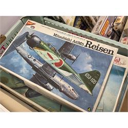 Twelve scale model kits, comprising ten model aircraft kits from Hasegawa, Nichimo, Fujimi and Matchbox, and two further Hasegawa 1:8 scale aircraft mounted machine gun kits, in two boxes 