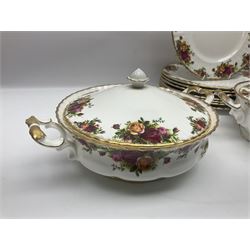 Royal Albert Old Country Roses pattern part tea and dinner service, to include two tureens, eight dinner plates, six side plates, twelve bowls, two mugs, seven teacups and saucers, milk jug,  twelve cake plates, six soup bowls and saucers, candlesticks, etc (95)