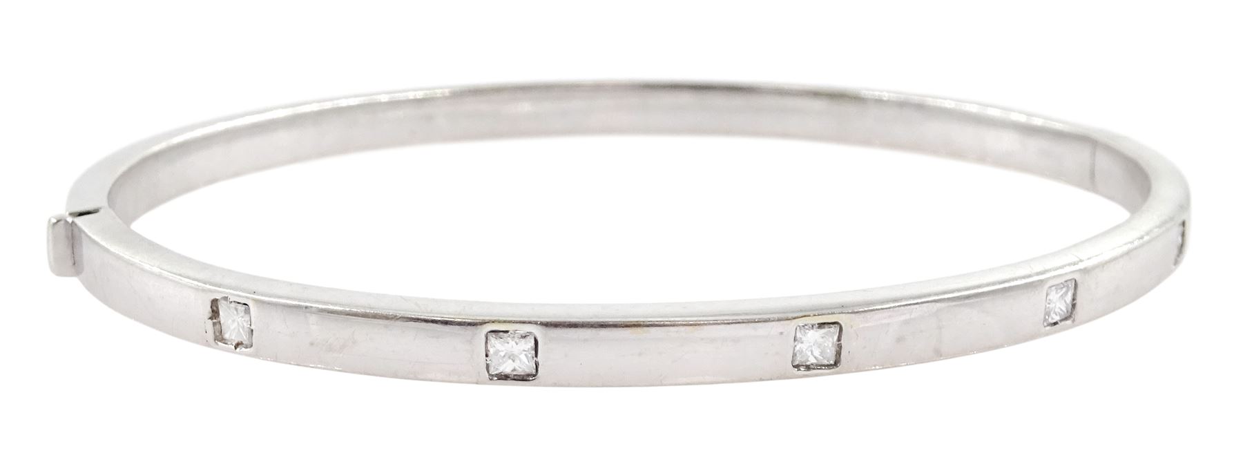 18ct white gold rubover set five stone princess cut diamond hinged bangle, stamped 750