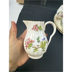 Coalport part tea service, decorated with floral sprigs, including eight cups and saucers, milk jug, eight dessert plates etc  