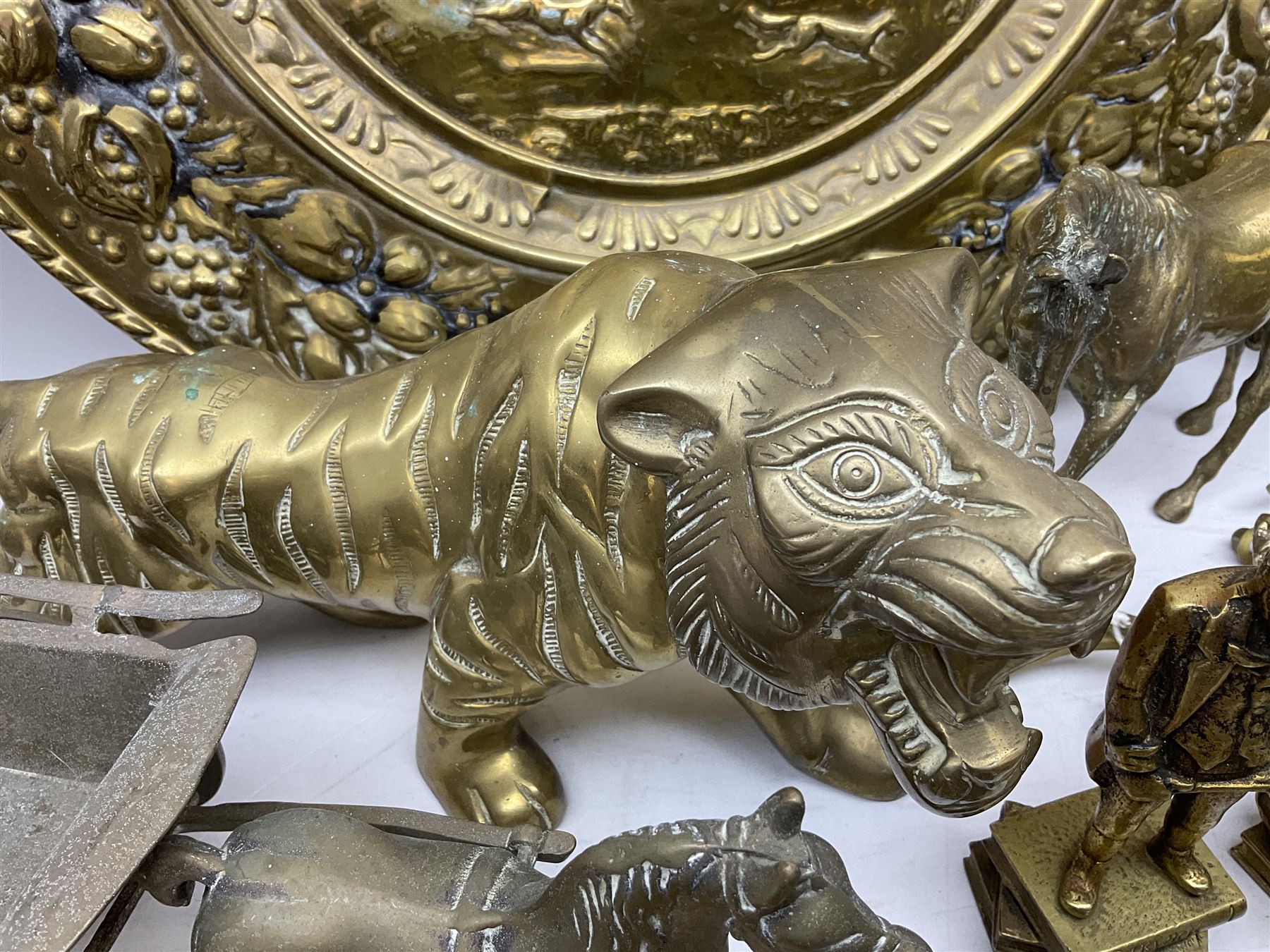 Large brass sculpture, together with a quantity of metalware, including brass tiger with gaping mouth, copper horn, brass dog with a pheasant , collection of brass horses, brass door knocker etc, sculpture H80cm