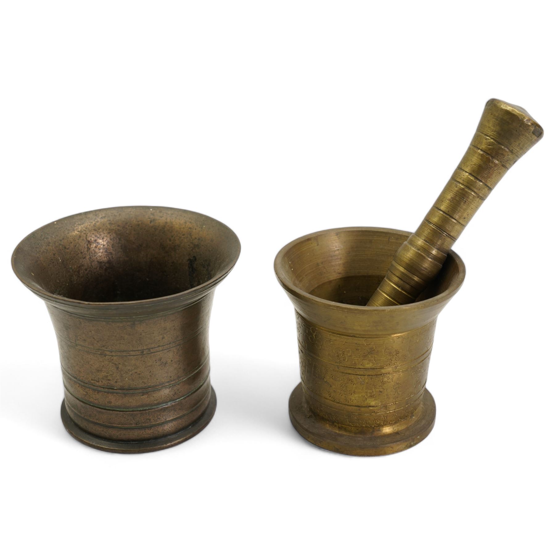 19th century Eastern bronze pestale and mortar, together with an earlier bronze mortar, H11cm (3)