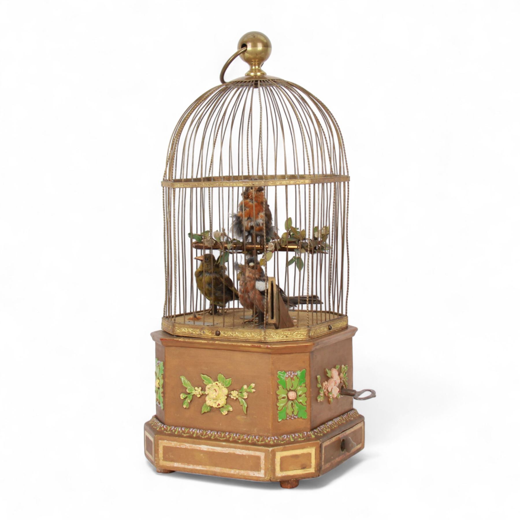 Late 19th century coin operated trio of singing birds in cage automaton, probably by J Phalibois, French, the three taxidermy birds with moving heads, beaks and tail feathers synchronized to the birdsong, under a gilt brass cage with one penny coin entry shoot, The gilt canted rectangular base with barbola decoration, H58cm