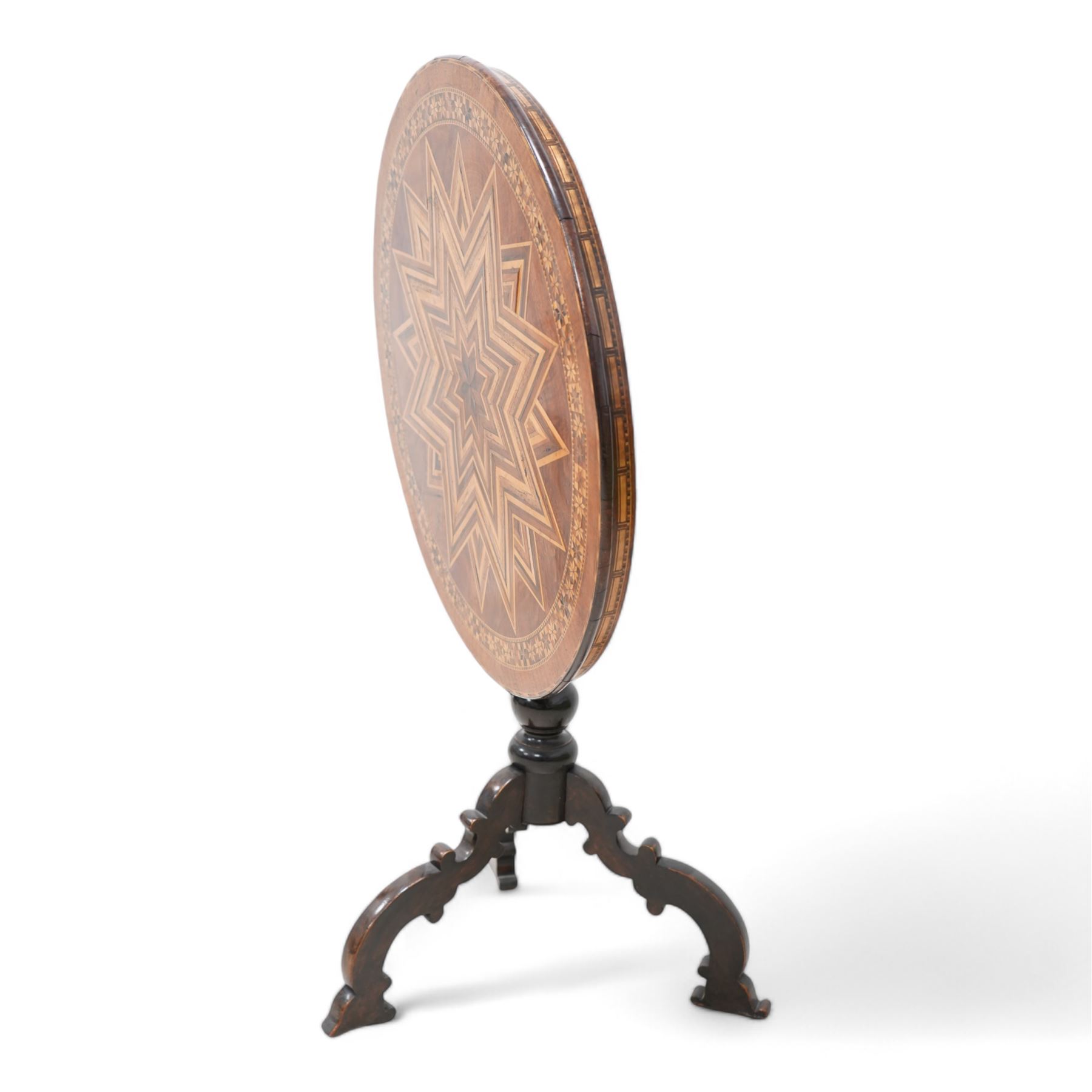 19th century inlaid walnut Italian Sorrento table, circular tilt-top with geometric star inlay and parquetry band decorated with stylised flowerheads, on turned column with three out splayed silhouette supports 