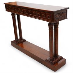 Neoclassical design mahogany console table, rectangular top over Greek key carved frieze with foliate carved back and sides, raised on twin pilaster end supports with acanthus capitals, on a plinth base